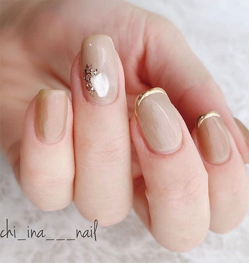 Nudy beige gel nail design with gold accent with Weekly Gel